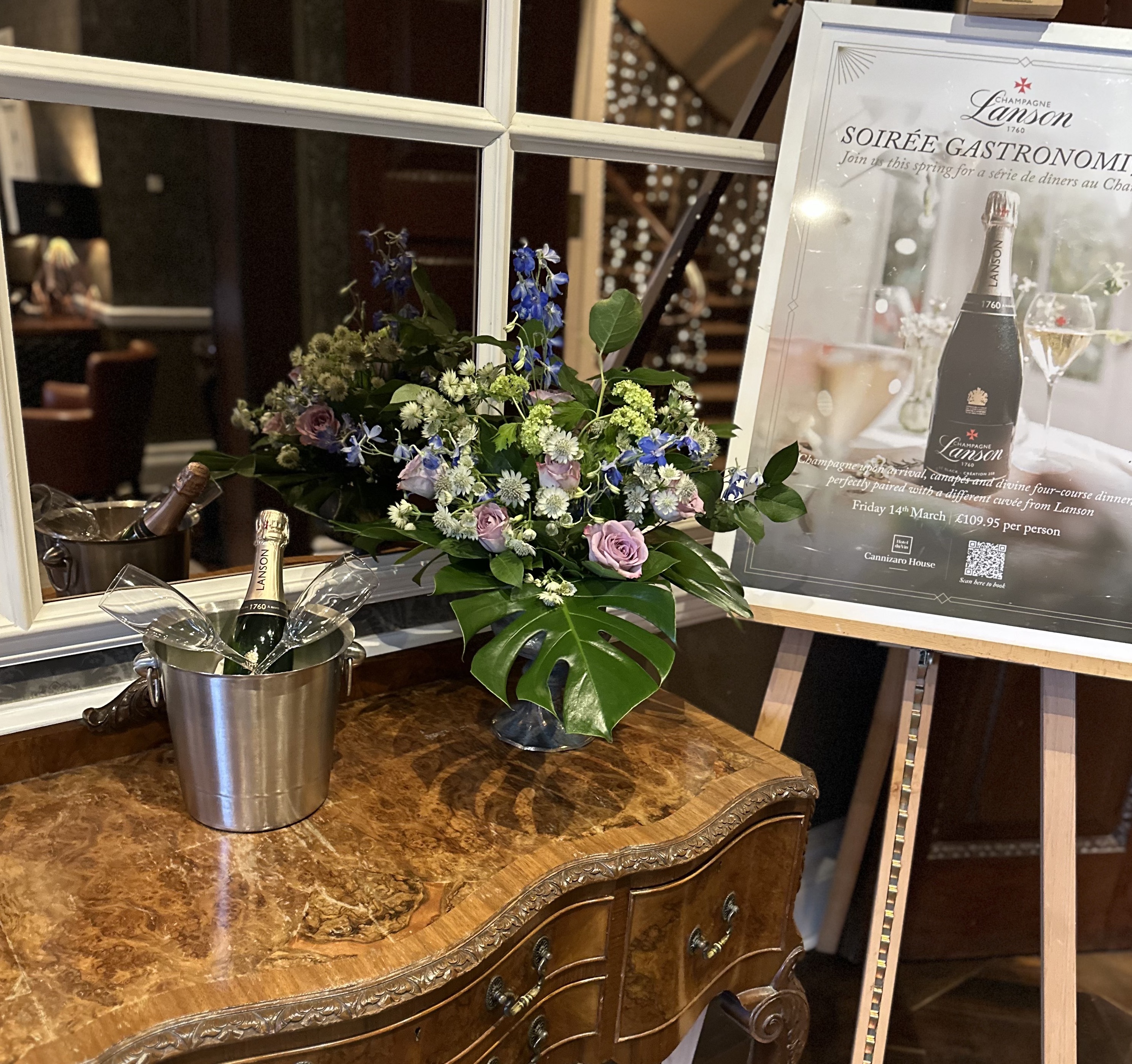 Cannizaro Hotel Reception with purple and pink flowers